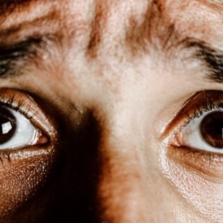 extreme close up photo of frightened eyes